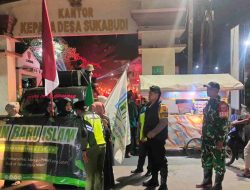 Semarak Tahun Baru Islam 1448 Hijriah, Babinsa Kawal Pawai Obor Meriahkan Desa Sukabudi