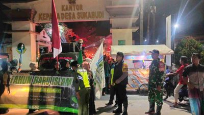 Semarak Tahun Baru Islam 1448 Hijriah, Babinsa Kawal Pawai Obor Meriahkan Desa Sukabudi