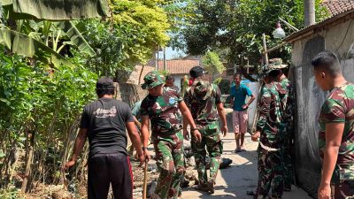 Hari Ke-11 TMMD Ke-129, Satgas Rawat Hasil Pengecoran Jalan Agar Tetap Berkualitas